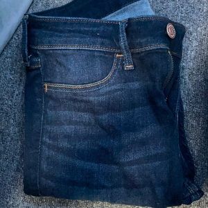 no rips. dark wash jeans